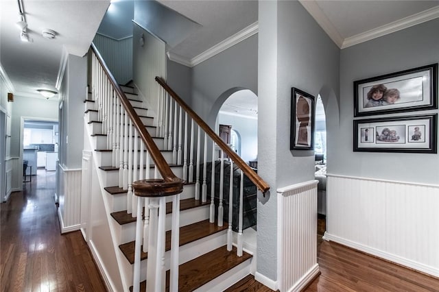 261 Louisiana Ave, Corpus Christi, TX 78404 - stairs with arched walkways, wood finished floors, ornamental molding, and wainscoting