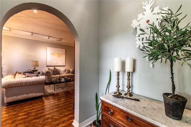 261 Louisiana Ave, Corpus Christi, TX 78404 - hallway with arched walkways, track lighting, and crown molding