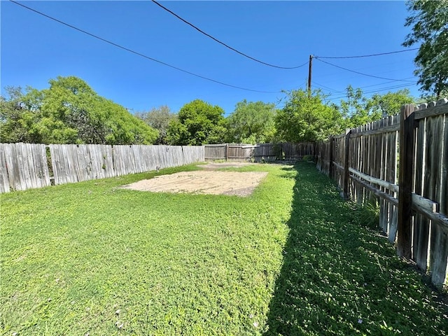 view of yard featuring a fenced backyard and a patio