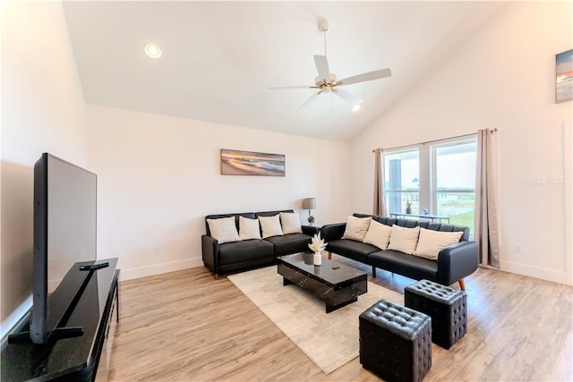 living area with high vaulted ceiling, baseboards, light wood finished floors, a ceiling fan, and recessed lighting
