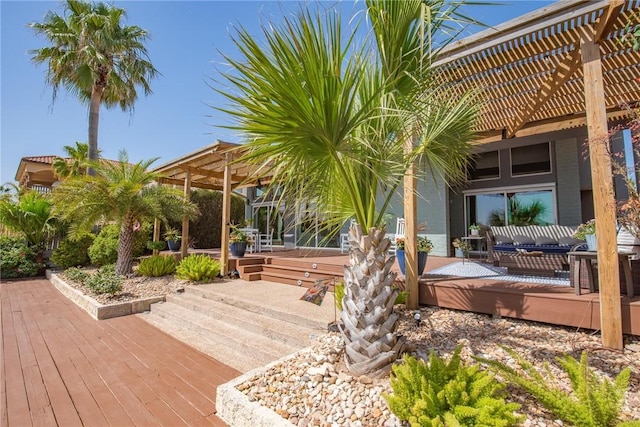 wooden deck with a pergola