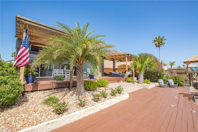 deck with a gazebo and fence