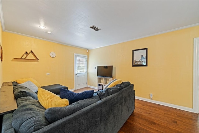 149 Rossiter St, Corpus Christi, TX 78411 - living room featuring crown molding, wood finished floors, and baseboards