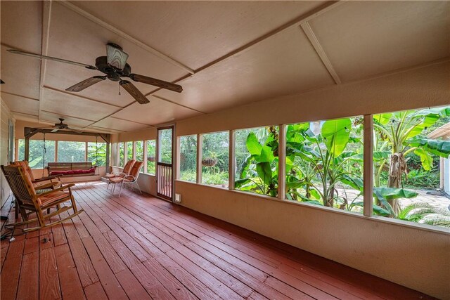 149 Rossiter St, Corpus Christi, TX 78411 - unfurnished sunroom with hardwood / wood-style floors, healthy amount of natural light, and vaulted ceiling