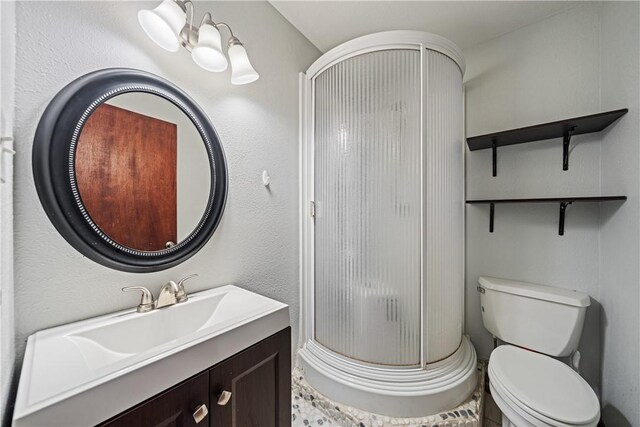 149 Rossiter St, Corpus Christi, TX 78411 - bathroom with vanity, a stall shower, and toilet