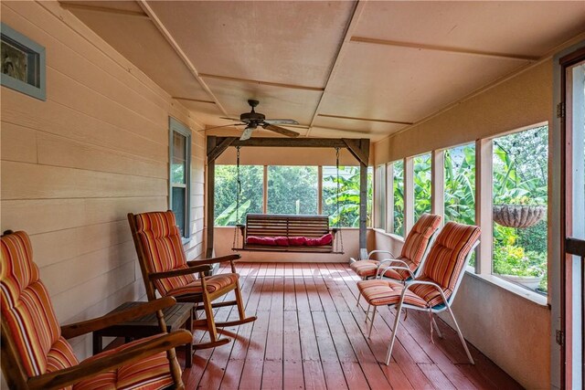 149 Rossiter St, Corpus Christi, TX 78411 - sunroom featuring ceiling fan, hardwood / wood-style flooring, and wooden walls