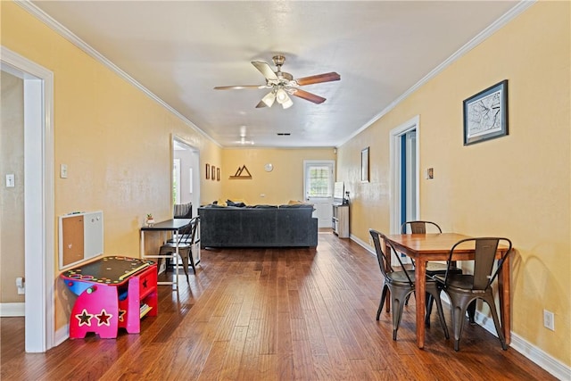 149 Rossiter St, Corpus Christi, TX 78411 - dining room with hardwood / wood-style floors, ceiling fan, ornamental molding, and baseboards