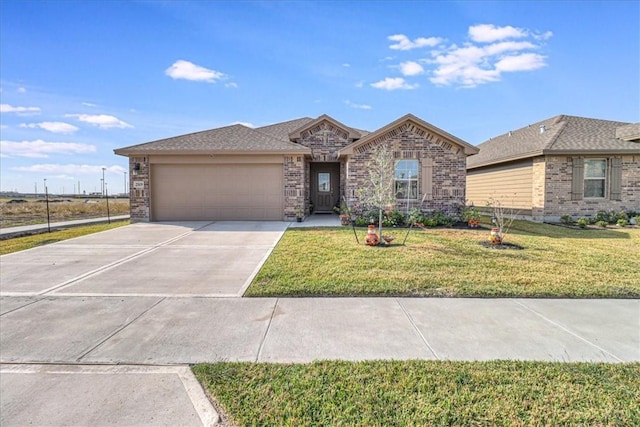 ranch-style house featuring concrete driveway, brick siding, an attached garage, and a front yard