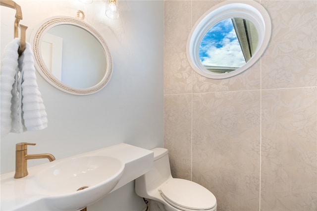 bathroom with sink and toilet