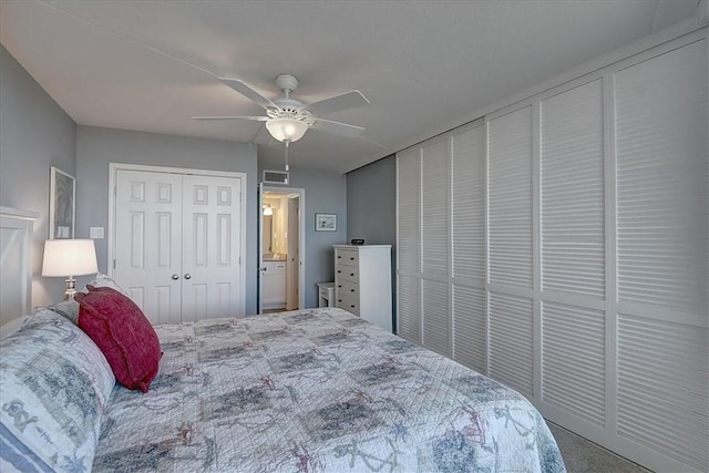 carpeted bedroom with ceiling fan