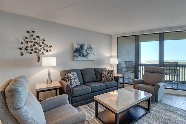 living room with floor to ceiling windows