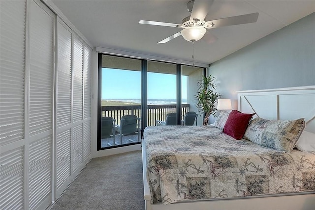 bedroom featuring ceiling fan, carpet floors, access to outside, and floor to ceiling windows