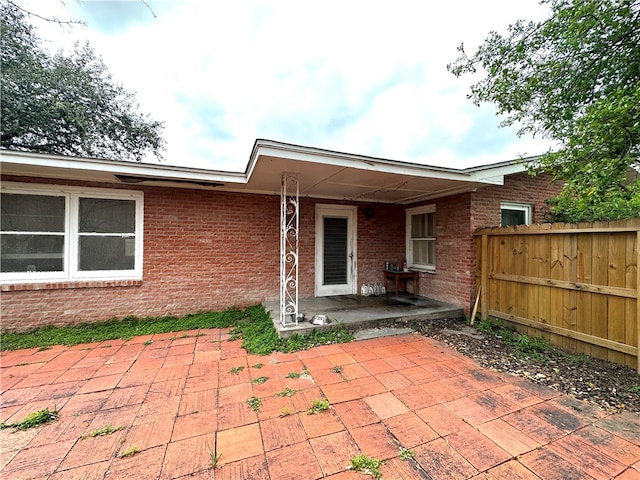 rear view of property with a patio area