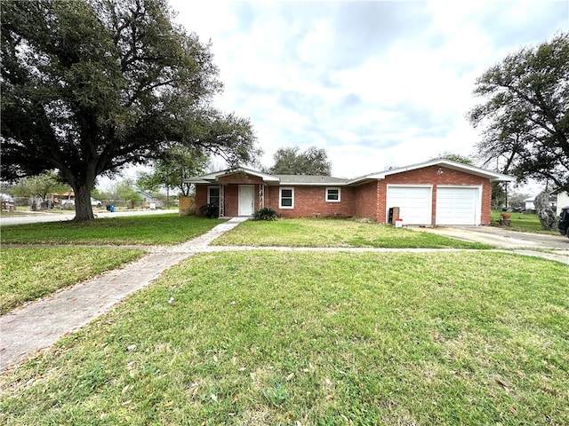 single story home with a garage and a front yard