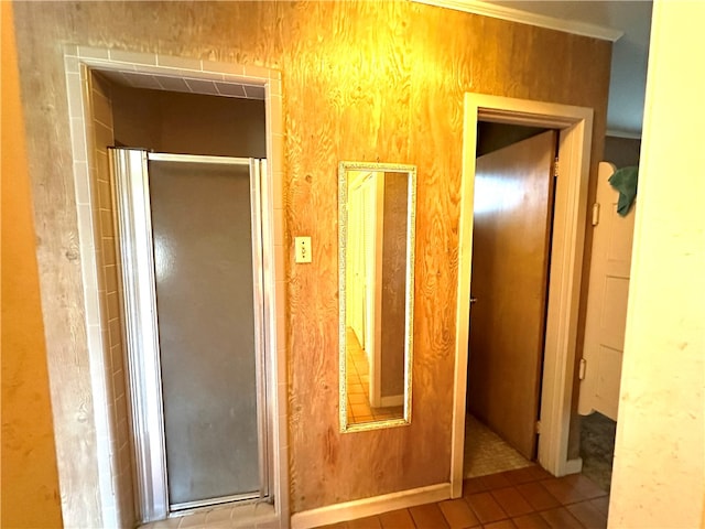 corridor featuring light tile patterned flooring