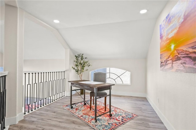 office featuring recessed lighting, vaulted ceiling, baseboards, and wood finished floors