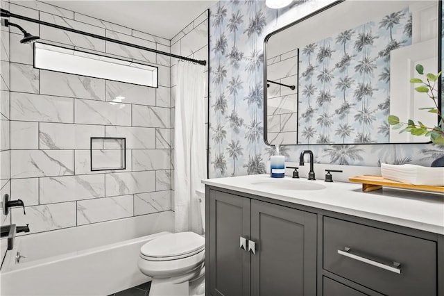 bathroom featuring vanity, shower / bathtub combination with curtain, toilet, and wallpapered walls