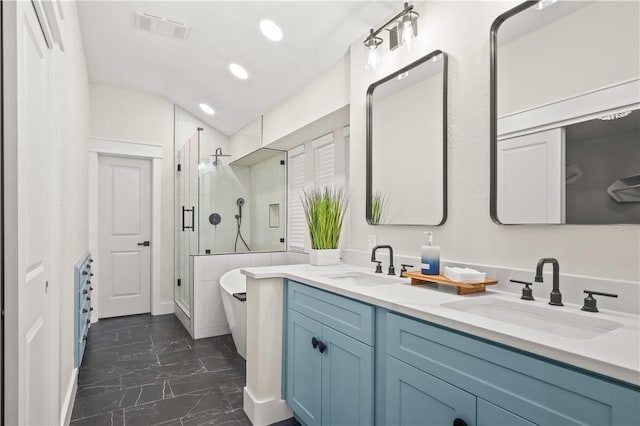 full bathroom featuring marble finish floor, a stall shower, a sink, and visible vents