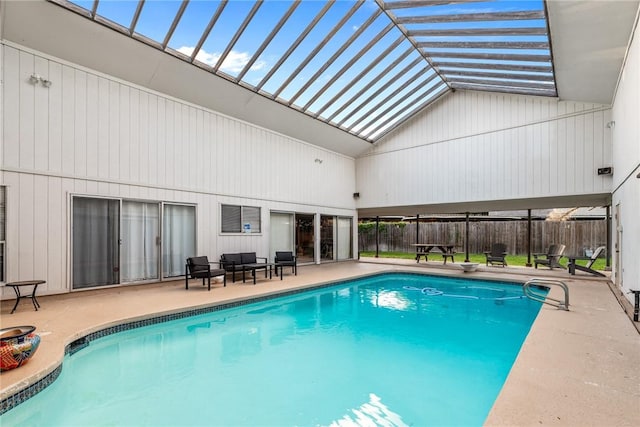 view of pool featuring an outdoor living space and a patio