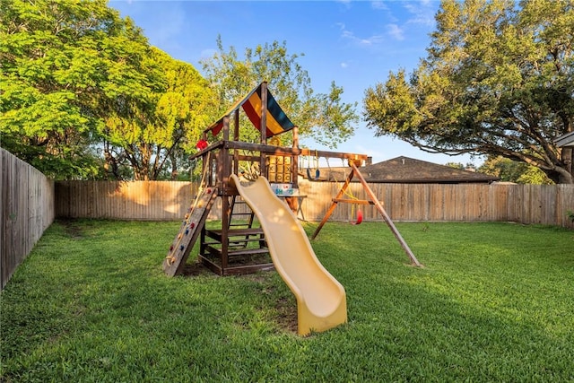 view of play area featuring a lawn