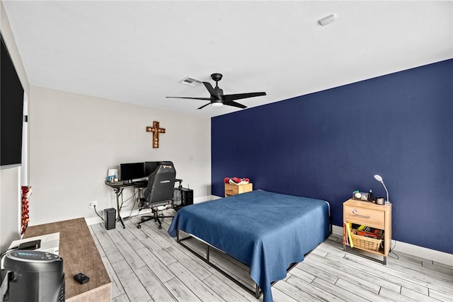 bedroom featuring ceiling fan and light wood-type flooring