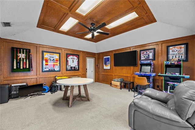 interior space featuring ceiling fan and vaulted ceiling