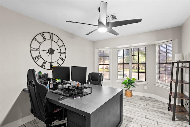 office area featuring ceiling fan and light wood-type flooring