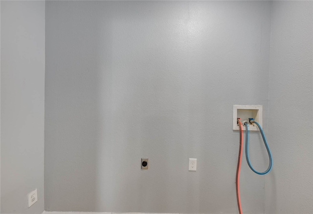 laundry area featuring electric dryer hookup, washer hookup, and laundry area