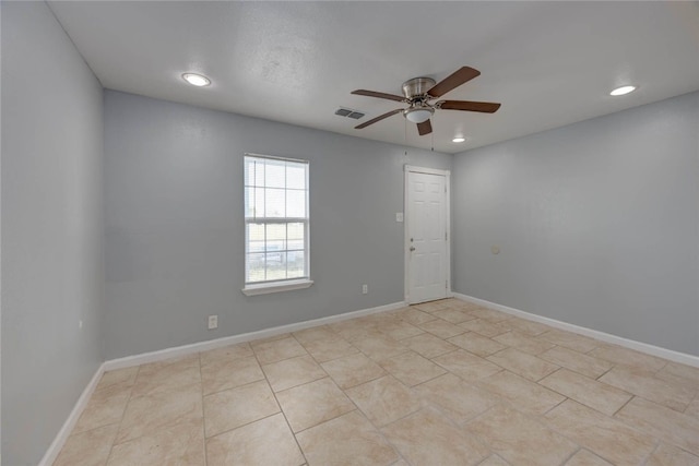 unfurnished room featuring a ceiling fan, visible vents, baseboards, light tile patterned flooring, and recessed lighting