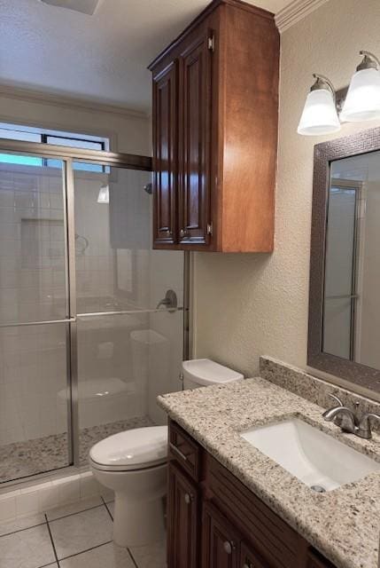 4202 Wolf Creek Dr, Corpus Christi, TX 78413 - bathroom with vanity, crown molding, a stall shower, tile patterned floors, and a textured wall
