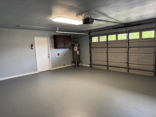 4202 Wolf Creek Dr, Corpus Christi, TX 78413 - garage with a garage door opener and electric water heater