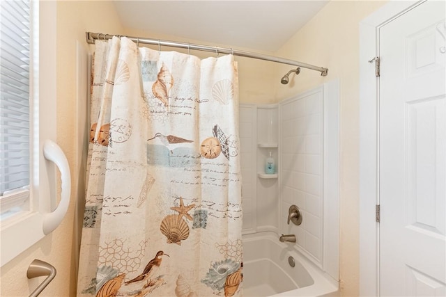 full bath featuring shower / bath combo with shower curtain