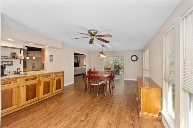 2641 Linn, Corpus Christi, TX 78410 - dining area featuring light wood finished floors and ceiling fan