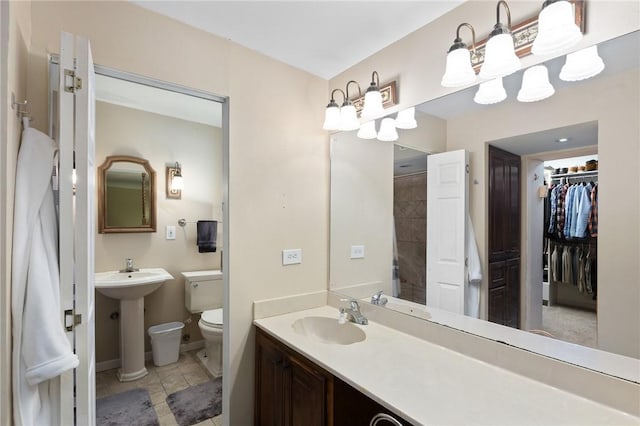 2641 Linn, Corpus Christi, TX 78410 - bathroom with a sink and a spacious closet
