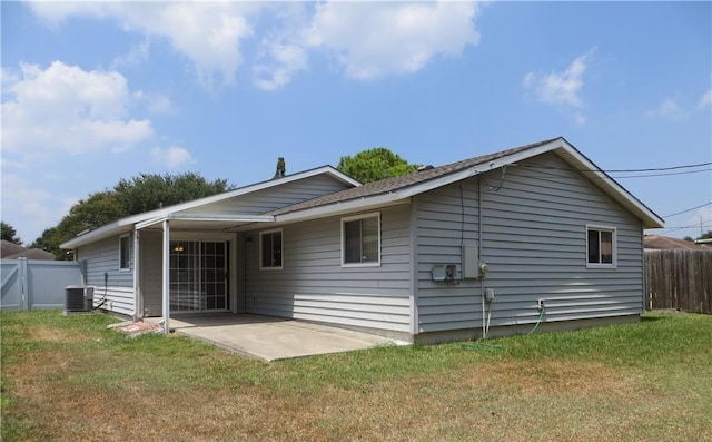 back of house with a patio