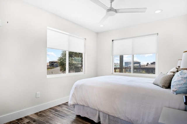 411 S 12th St, Port Aransas, TX 78373 - bedroom featuring dark wood-style flooring, recessed lighting, and ceiling fan