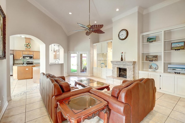 6613 Belvoir Ave, Corpus Christi, TX 78414 - living room featuring light tile patterned flooring, ceiling fan, ornamental molding, arched walkways, and recessed lighting