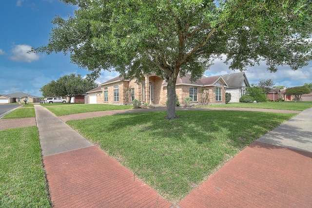 6613 Belvoir Ave, Corpus Christi, TX 78414 - view of front of home featuring a front yard and stone siding