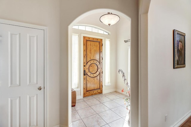 6613 Belvoir Ave, Corpus Christi, TX 78414 - entryway with light tile patterned floors and arched walkways