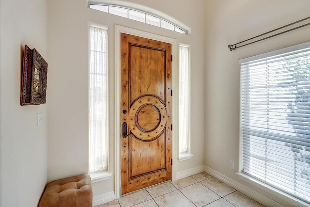 6613 Belvoir Ave, Corpus Christi, TX 78414 - entryway featuring light tile patterned floors and baseboards