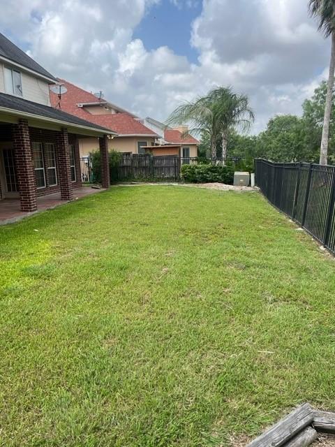 8038 Bar Le Doc Dr, Corpus Christi, TX 78414 - view of yard with a patio