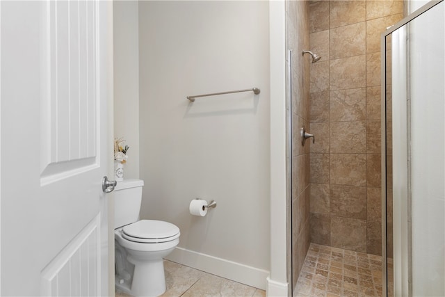 bathroom with toilet, an enclosed shower, and tile patterned flooring