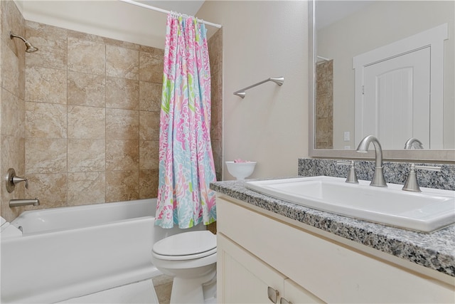 full bathroom featuring toilet, vanity, shower / bath combo with shower curtain, and tile patterned flooring