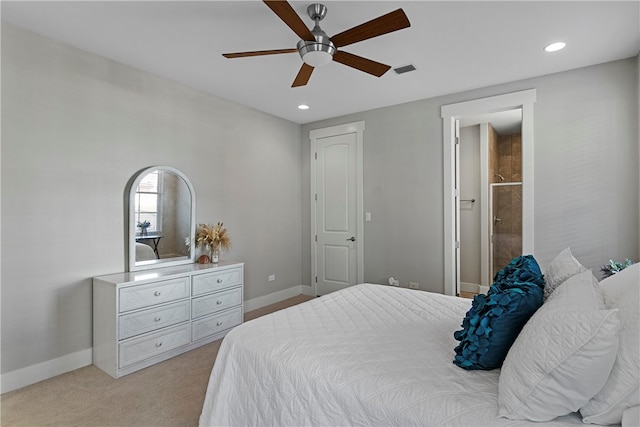 bedroom with ceiling fan and light carpet