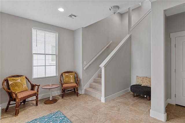 sitting room featuring light tile patterned floors