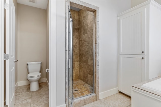 bathroom featuring toilet, tile patterned flooring, and walk in shower