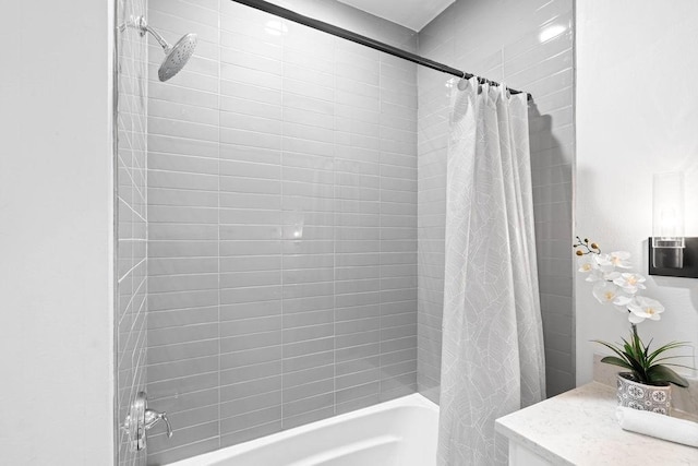 bathroom with shower / bath combination with curtain