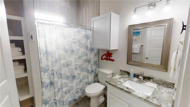 15110 Arashi Beach Dr, Corpus Christi, TX 78418 - bathroom with vanity and a shower with shower curtain
