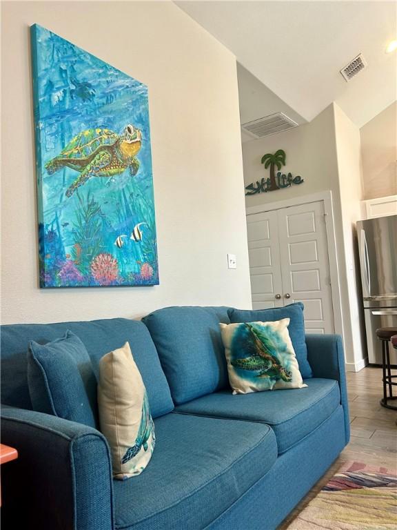 15110 Arashi Beach Dr, Corpus Christi, TX 78418 - living area featuring wood finished floors
