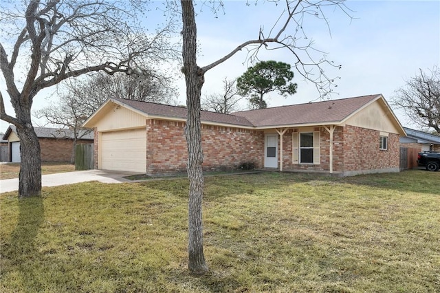 single story home with a garage and a front lawn